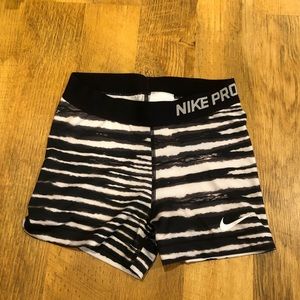 2 pairs of Nike pros